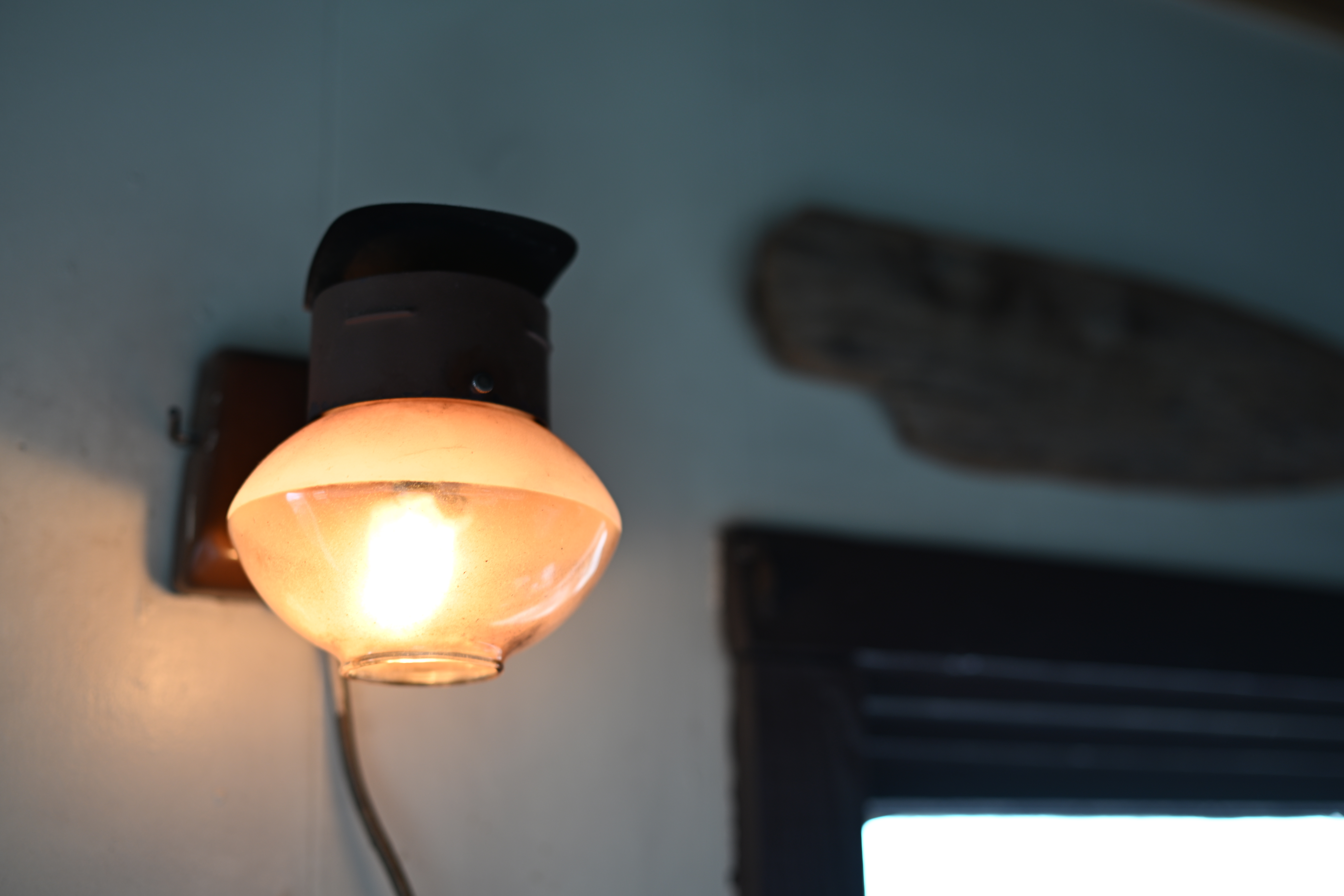 Cozy oil lamp ambiance inside Captain's Quarters rental